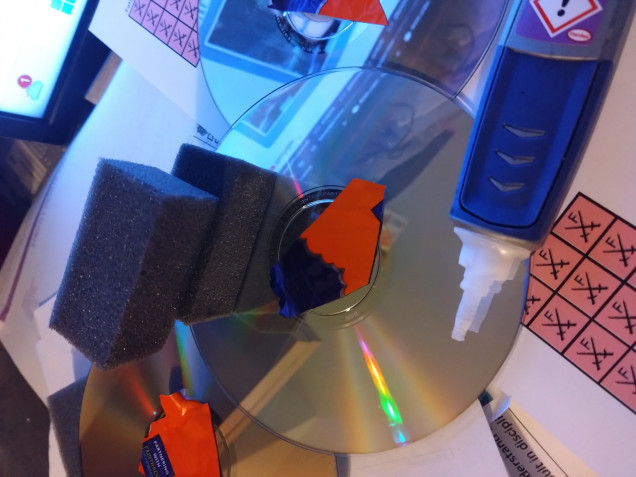 Covering up the holes on the CD and showing off the foam I intend to use for the stone.