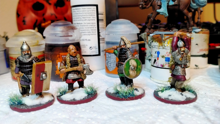 Preparing for a month of SAGA in August. These are Pagan Rus/Viking Hearthguard. I mark my hearthguard with a red base.