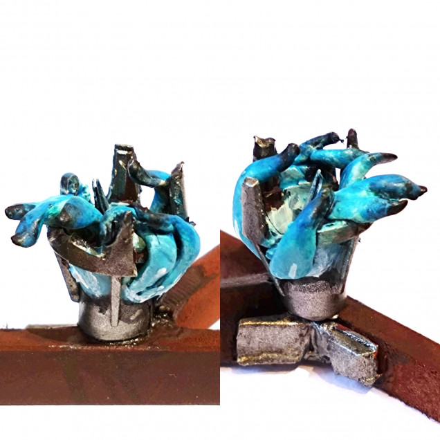 I painted up the brazier and the flames. I will persevere with 2 more of these but know now that I should add more greenstuff and fill out the cage more and then add the lapping flames at the end. Also get more height on the flames because at the moment it looks more like tentacles than flames.