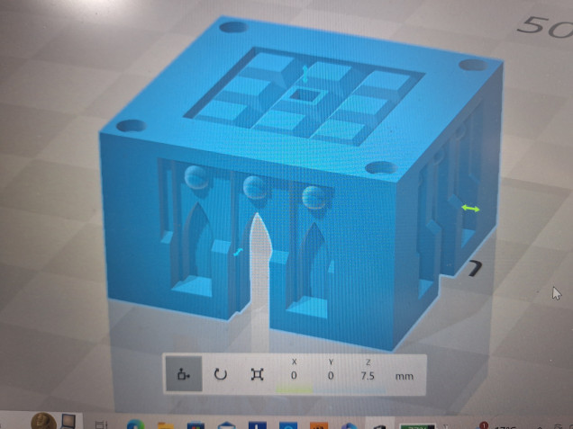 After adding some 2mm by 1mm magnet holes the first building is finished (in a digital sense). The building can be placed directly on my printer build plat. The combination of open windows at the base, drainage hole in the roof and the taper to the roof means resin will drain out as it prints. Also the taper to the roof means it doesn't need supports.