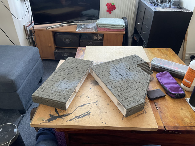 I was able to carefully cut it in two and before doing anything else I added do supports inside the structure to prevent sagging and as such allow scenery to sit flat on the raised area. 