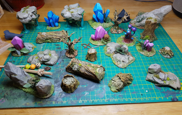 I'm ready to start applying flocks and details to these modular components. I''m sure most of you can tell what's been used, it's nothing unusual: birch seeds; fishtank plants, recoloured - they tend to be garish; flock; sticky flowers and grasses.