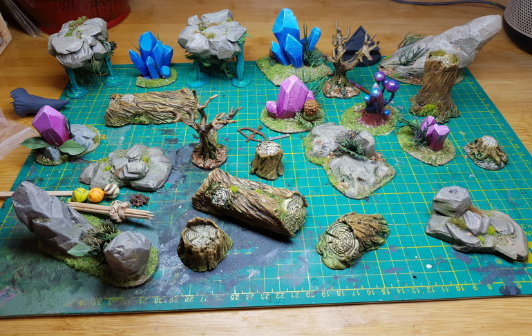 I'm ready to start applying flocks and details to these modular components. I''m sure most of you can tell what's been used, it's nothing unusual: birch seeds; fishtank plants, recoloured - they tend to be garish; flock; sticky flowers and grasses.