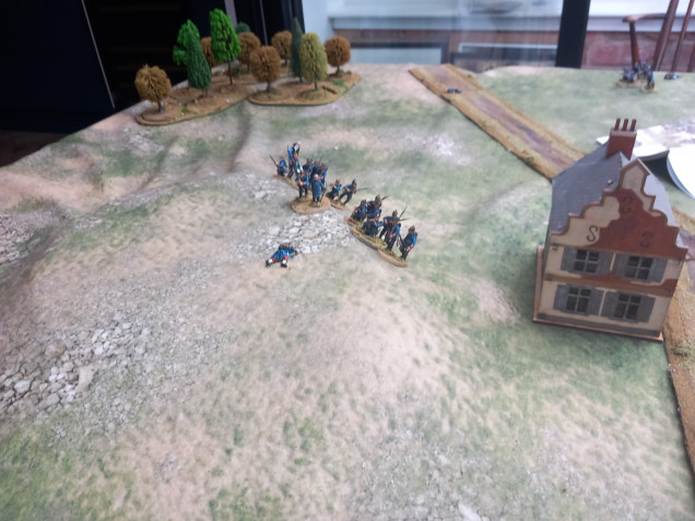 Both sides took the easy objectives represented by casualty markers but the hill was harder to reach. The prussians can spend command points on a doctrine to double their move so crested the hill first