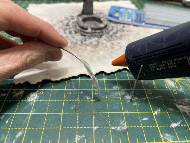 Run a bead of cool melt hot glue over it to the width you like.