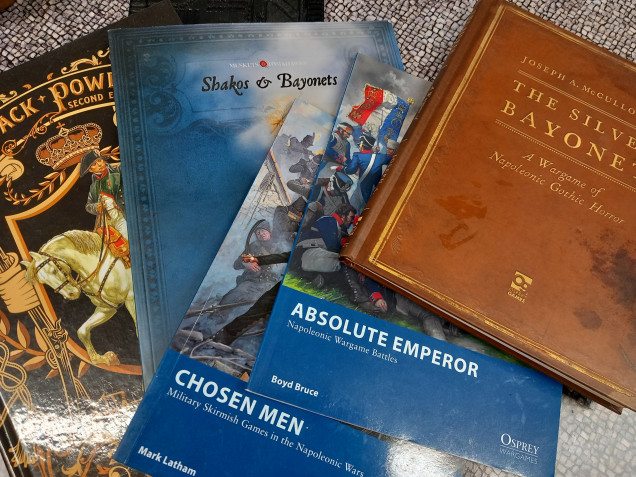 First decision is to pick a rules system. There are plenty to choose from but it depends what level of game yout after. For 28m i used to play chosen men but moved on to Shakos and bayonets which is a variationof the musketsand tomahawks rules system. This is great for skirmishgames snd i wouldnt want to attemptany thing largercthan a skirmishgame in 28m.  Its a card drivensystemwirh lots of great dramatic monents making it cimenamatic and story driven. It allows you to pick a nationality and create a reasonable sized force without going overboard. This is the rules set im sticking with for 28m.to.