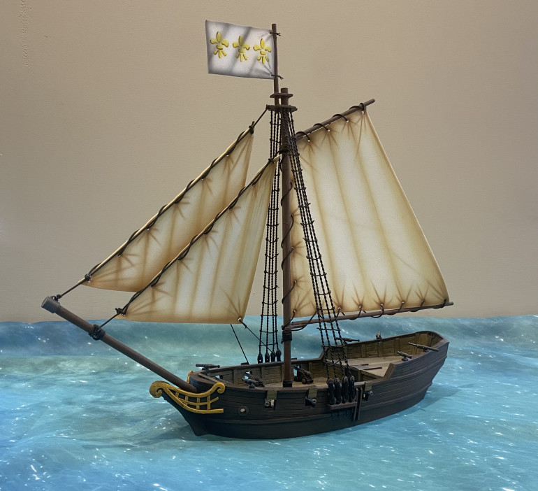 Another small sloop, this time flying French colours.  Armed with 6 small cannons and 4 swivel guns.  Model is from the Firelock Games range of resin ships.