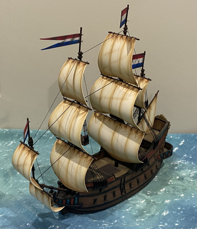 My largest finished ship, the Galleon from Firelock Games.   Flying Dutch colours this slow hulk is bound to be a prime target due to all the cargo it carries.  It won't go down easily though, armed with 28 cannons and room for 8 swivel guns it will be a brave captain indeed who takes on this behemoth.