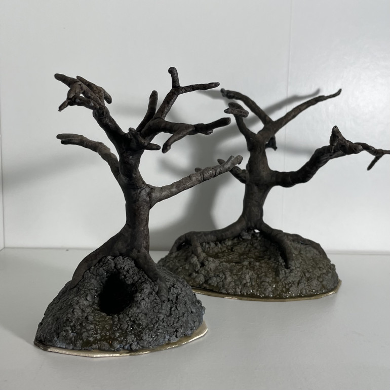 Chipping away but spent some time painting the trees as well. After making the wire frame covering in green stuff and attaching to a base I give it a black undercoat and then a zenithal grey to white coat. Ready for painting. 