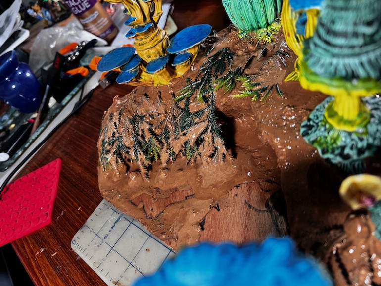 Goes on gloppy but really holds down the chopped up plastic plant I use as roots.