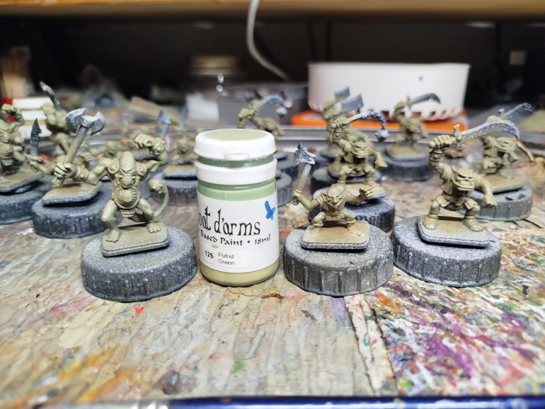 Second drybrush highlight is with Coat d'Arms Putrid Green