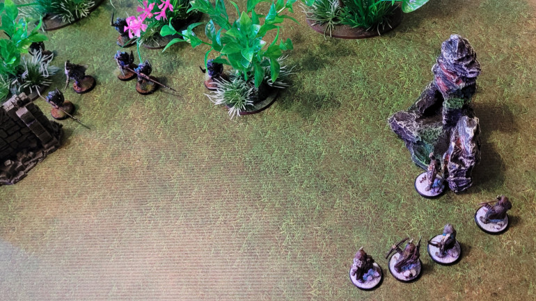 My opponent spends her next turn milling about at the other end of the clearing, and a few lucky movement rolls allow me to get two of my Atlanteans into base contact for some close combat. Unfortunately, the ravenous beasts have caught up with one of my slower-moving units...