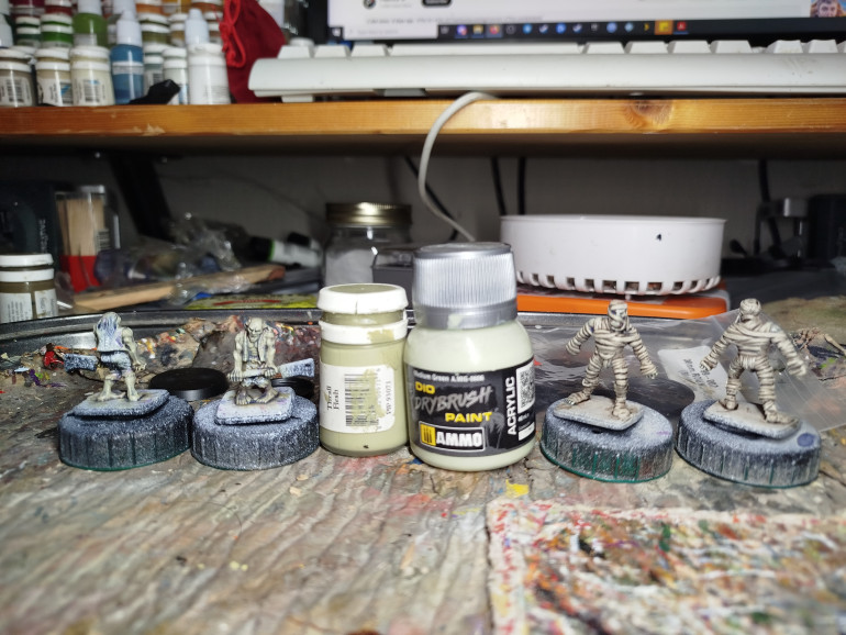 It was drybrushed up with more P3 Thrall Flesh, and then Ammo Mig Medium Green.  Thats the mummies finished.  I may or may not revisit to do the eyes.  Googling suggest they had their eyes removed and replaced with shells or some such so they don't really need to be there.