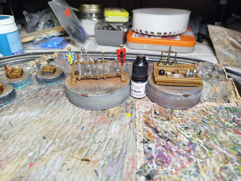 Paint the symbol and the ink wells black.  Edge highlight the symbol with dark grey, or P3 Coal Black if you want.   I didn't.