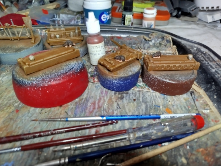 Wash the rat flesh.  i was going to use my GSW Pecatum Flesh Wash, but it's turned green for some reason.  Follow this up with a light drybrush of the base as desired