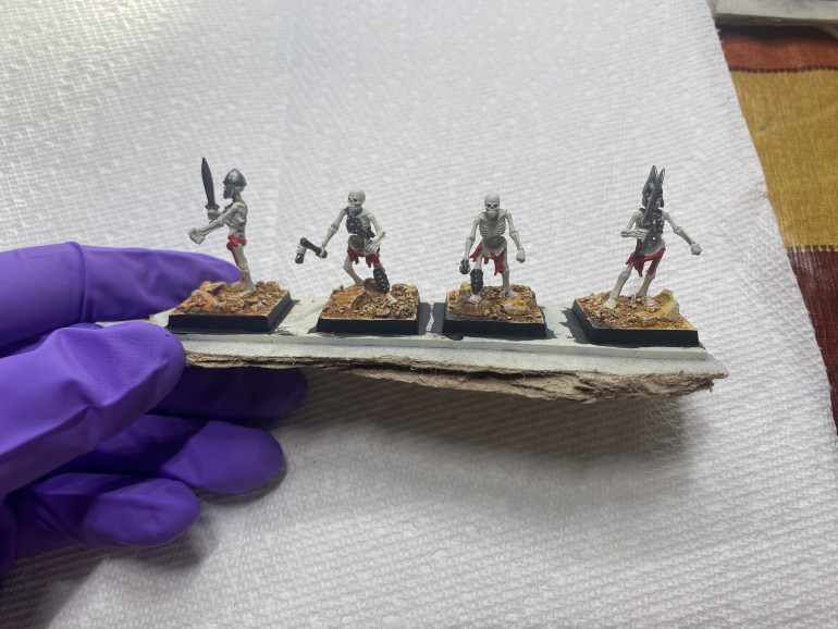 Boring stage of base coating the details and the metal bits. (You could also paint the metal after the oil wash)