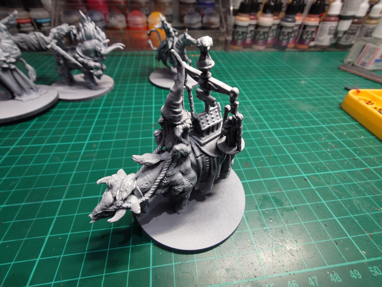 Famine an interesting mounted figure with a pointy hat