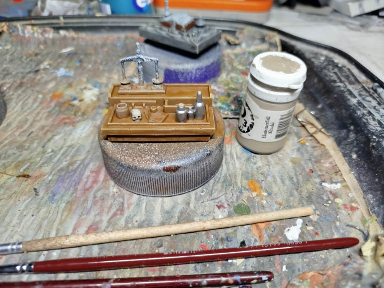 Paint the bottle stoppers.  The skulls were all painted the same as the Skeletons from earlier