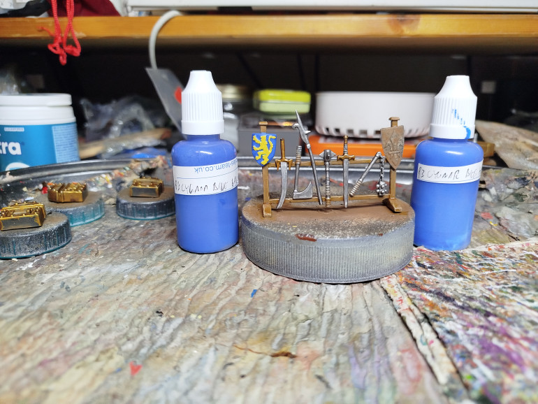Base the symbol with Cygnar Blue Base, then highlight with Cygnar Blue Highlight