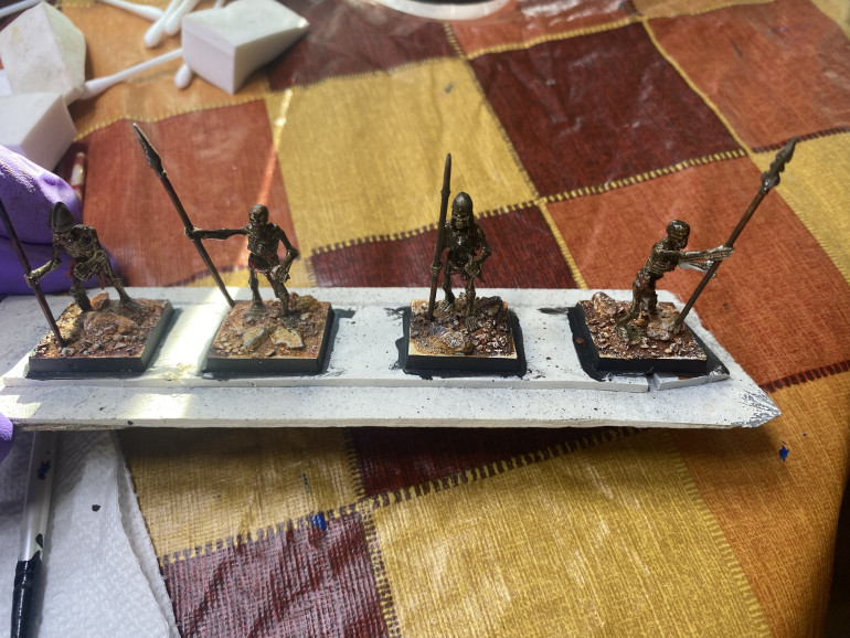 Secret sauce: streaking grime enamel wash by AK! (Also there is a bit of green enamel spread out on the models) 