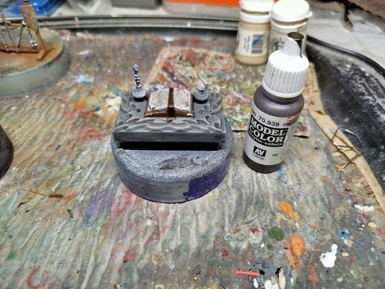 Paint the bookmark ribbon.  Smoke is a bit transparent, so let what's showing through do the work for you.