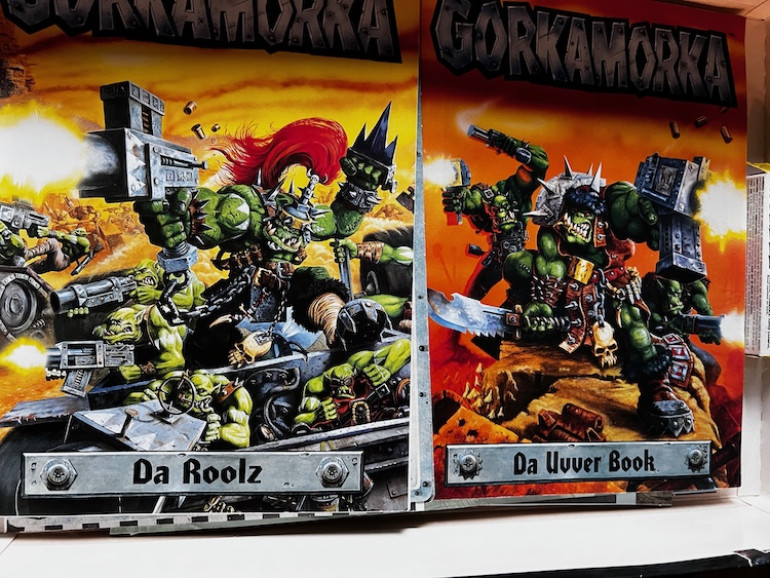 Both of the rule and background books are included and in great shape