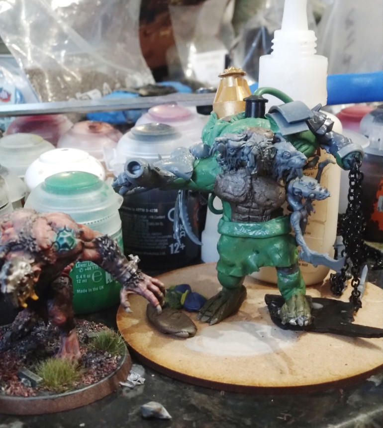 I added some more diabetic needle case parts to bulk out the shoulders. The rat faced grafts ended up under each armpit. I have learnt a lot of hard lessons on this model. I think it's going to look OK once painted. 