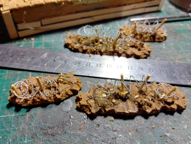 Made up some scatter terrain using lumps of cork with some barbed wire attached, also stuck some resin crates to cork tiles but forgot to picture them 