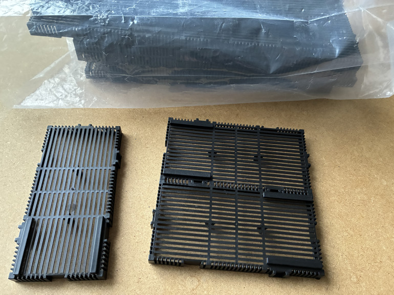 Plastic interlocking fish tank bases. Makes great flooring and are pretty inexpensive.