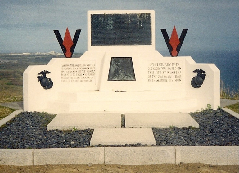 One of the Marine Corps memorials. This one is on top of Mt Suribachi. This one specifically is the site of the flag raising.  Behind the memorial you can see the airfield.  