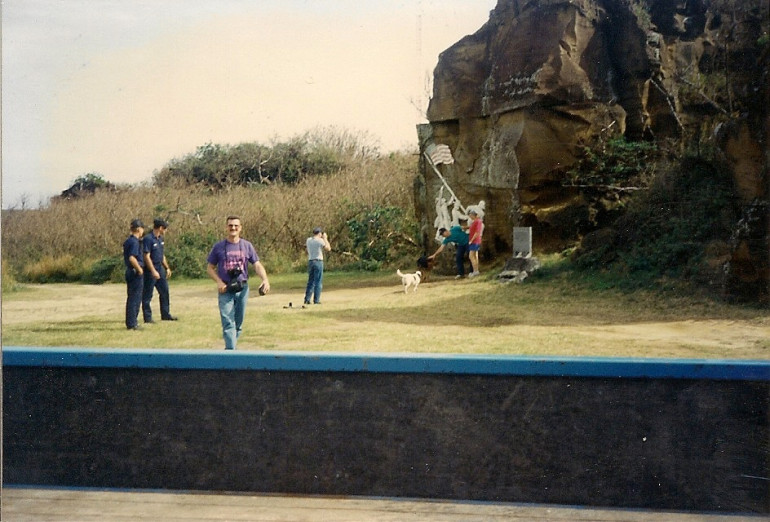 A few off duty military personnel viewing the memorials. There are no native inhabitants and there haven’t been any since WW2.  