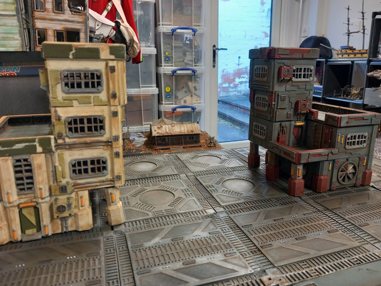 I got these two buildings from salute at the weekend and got them both done in two days. I haven't touched the interiors and I would like to add graffiti. Still room on the board for more