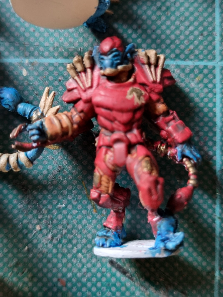 The Red looks better on the character definitely. Tried to go with an animal head for a badge. Pretty happy with it. Not super detailed tbh.