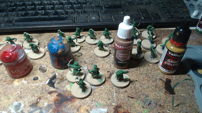 No two minis have the same colour pants and shirt. I had to juggle it a bit but I think it makes them look just casual enough but still uniformed. It's the classic idea of keeping the pallet the same but mixing up where you put the colours.