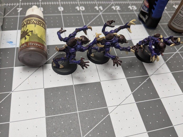 Two touched up models vs original in the middle