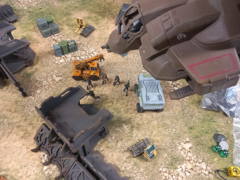 Armstrong is Wounded by acid blood as he defends the walls. His men pull him to safety as the dropshot arrives for evac. They know have information on what was in the outposts manifest and where the ambulance had come from. But why was it here? Armstrong and Beck both survived but need medical assistance 