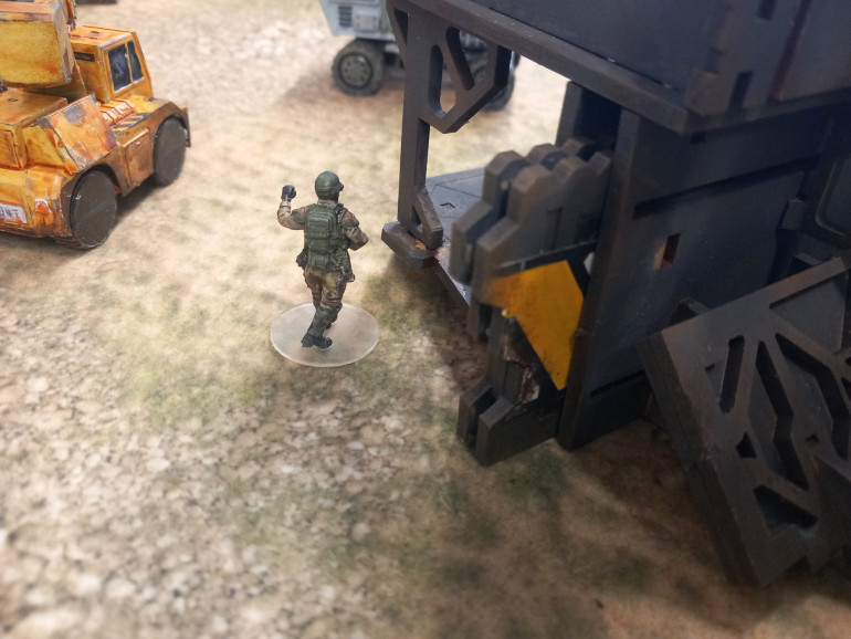 Armstrong leads from the front. His orders are to scout the observation platform on the walls while his men check the navigation computer on the parked ambulance 