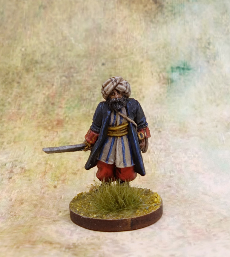 I used some colours from the John Blanche Army Painter new paint sets. A blue speed paint and a bright red.