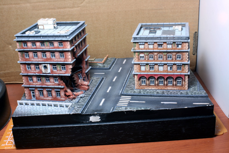 A view from the other side.  I decide to add some railing with the building sprue.