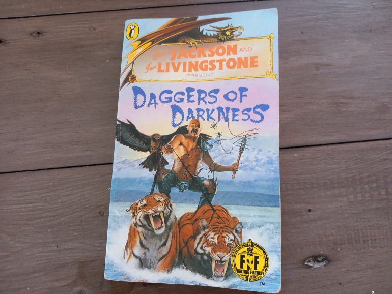 At first I was left confused by the Les Edwards cover. Is that a guy riding two tigers? Yep it is. Equally bad ass and ridiculous. This book is set in Khul where the land of Kazan has a vacant throne. An evil vizier is going to steal the throne unless can find some medallions beat the assassin's sent out to kill me and win the day.