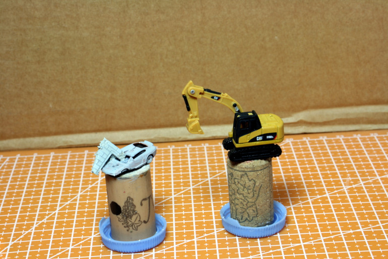 Civilian vehicles.  The lifter was primed with a matt varnish, and the car was turned into a wreck.