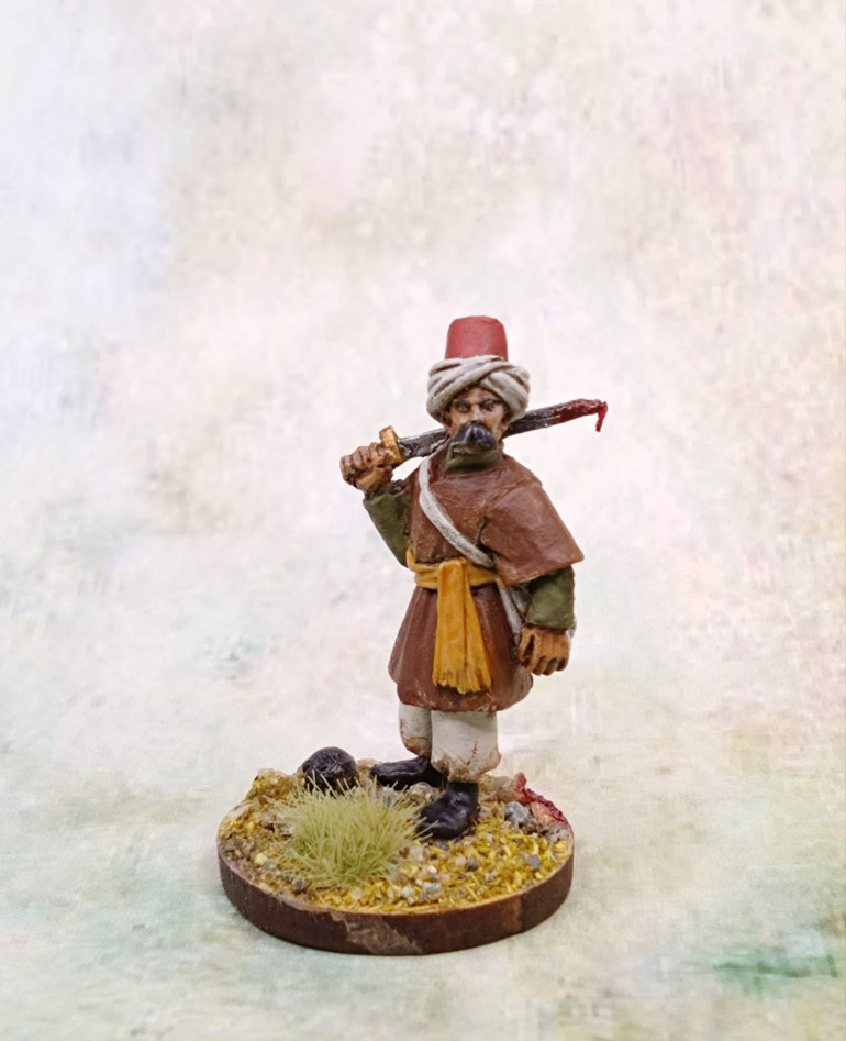 I found a small bead that passed as a cannon ball. I had kept most of the models light on weathering and blood, but felt I fancied adding some Blood for the Blood God and Zandri Dust at the coat edges.