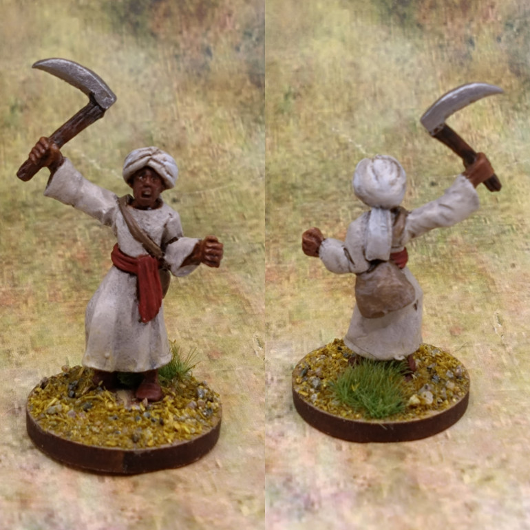 The conscript will be an interesting one to look up from a gameplay point of view. I followed the box art again on this scheme. The robes went from an Iraqi Sand brush on prime, to Wraithbone base and a Corax White highlight.