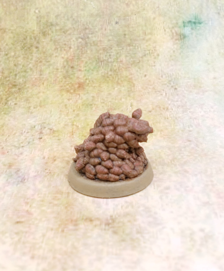 These were hit with Guilimam Contrast paint and highlighted with Cadian Fleshtone and a higher highlight with a white and Cadian Fleshtone mix.