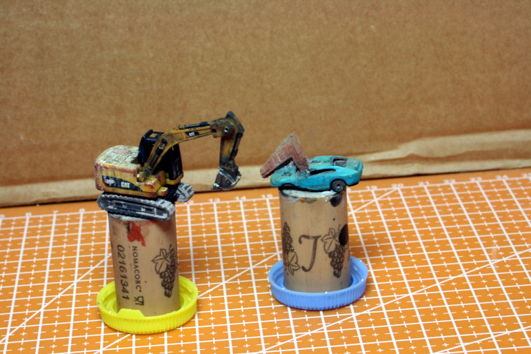 Civilian vehicles. The lifter was just weathered with minor painting, and the car was painted and weathered.