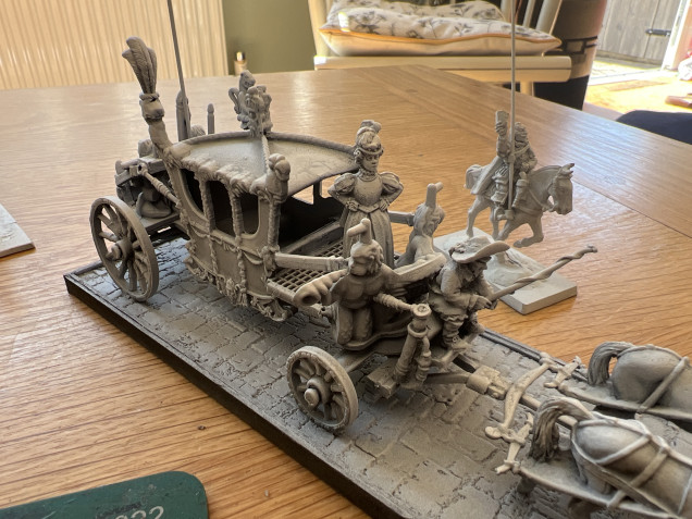 Does the lady Eliza need some kind of carbine or musket leaning near her?