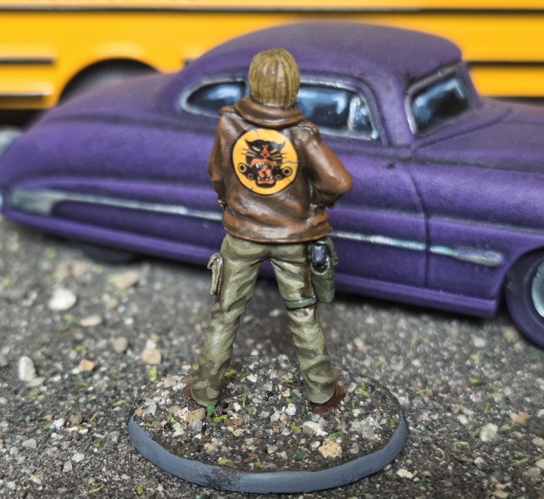 I found a suitable decal and with a lot of encouragement from Microsol and Microset this has contoured so well with the jacket.