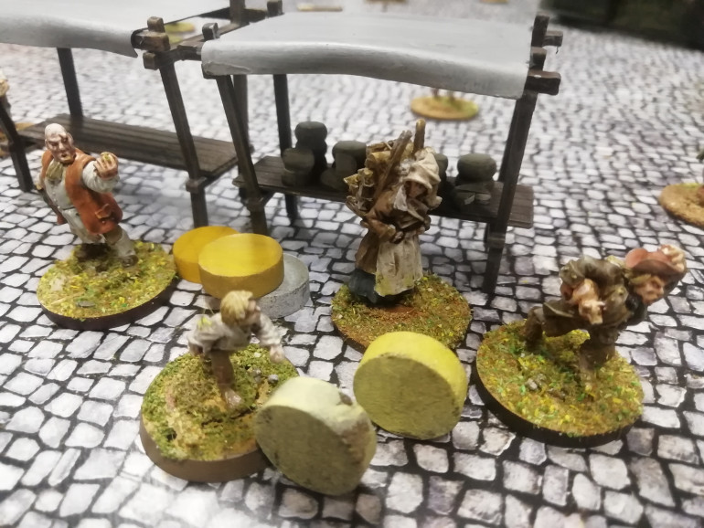 A couple of years ago I completed my previous cheese riot project that charted the creation of a game designed to recreate the events in Nottingham in 1766 when cheese prices led to a couple of days of rioting. Cheese was stolen and rolled away, the mayor knocked down by a rolling cheese while appealing for calm. Dragoons were called in and a man was killed by friendly fire. All this took place in the Nottingham market square during the annual goose fair. In my game each team of players control a duo of minis representing the women and 