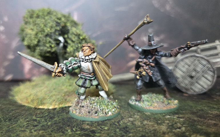 Soloman Kane is a conversion of a Rackham Witch hunter which I did over 20 years ago, he was put away undercoated but unpainted in a foam carrying box and at some point over the years his hand and staff were broken off and lost. I have thought about throwing him out on many occasions, but something stopped me.  So inspired by Deviltry Afoot and the Spring Clean Challenge I decided to resurrect him, I found a suitable hand, a cats head from a Rafm Egyptian model, some wire and some greenstuff and he was done. The Elizabethan gentleman is from Foundry and was based on a penny so I rebased him. 