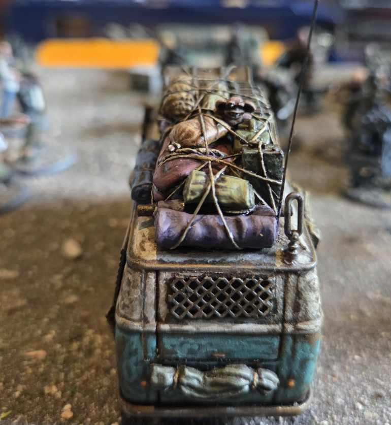 Hidden in the stowage is a weird stuffed toy, which came with the original Frothers release of the Tank Girl miniature seen earlier. 